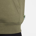 Load image into Gallery viewer, Nike SB Olympic Pack Fleece Pullover Hood Medium Olive / White
