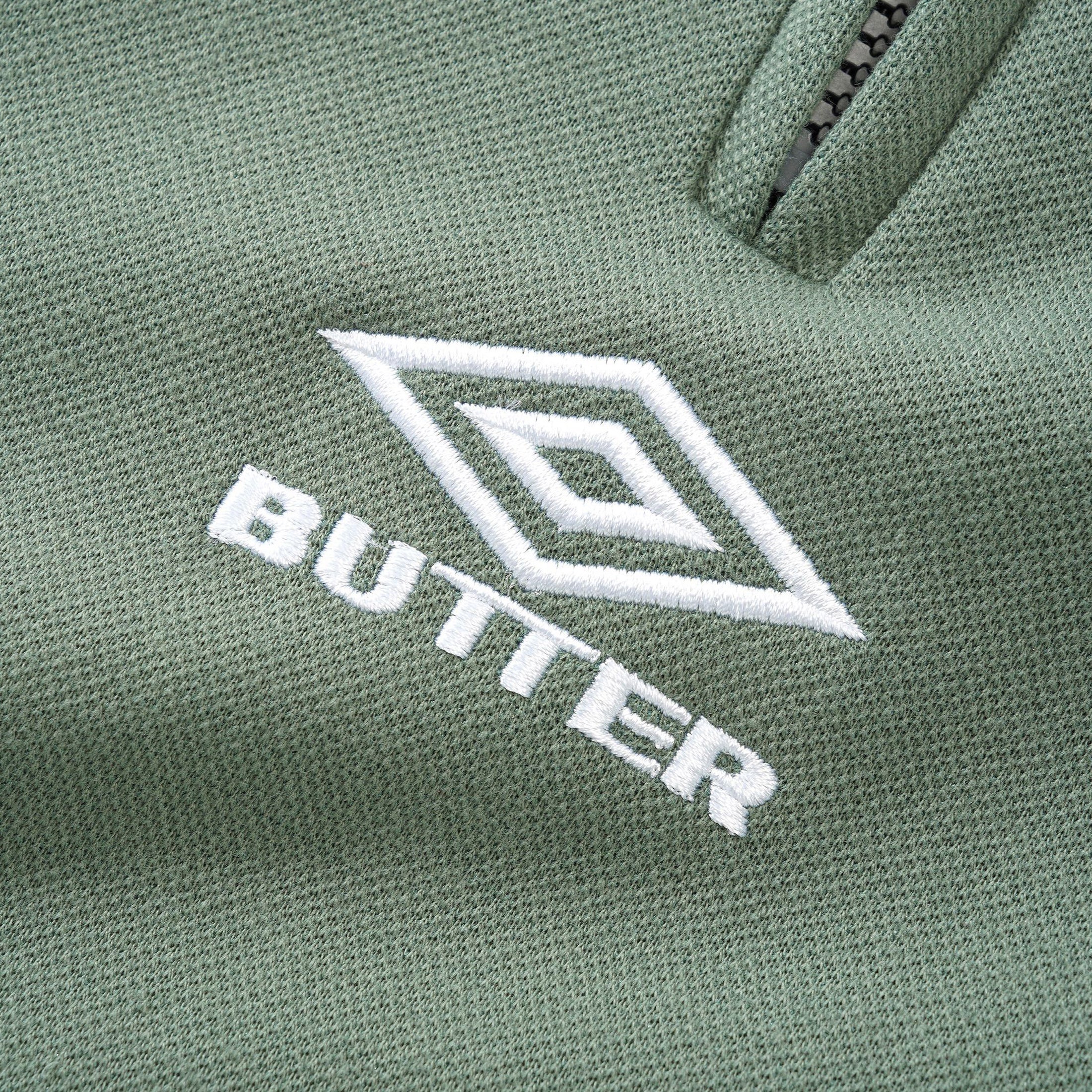 Butter Goods x Umbro Athletica Polo Shirt Sage