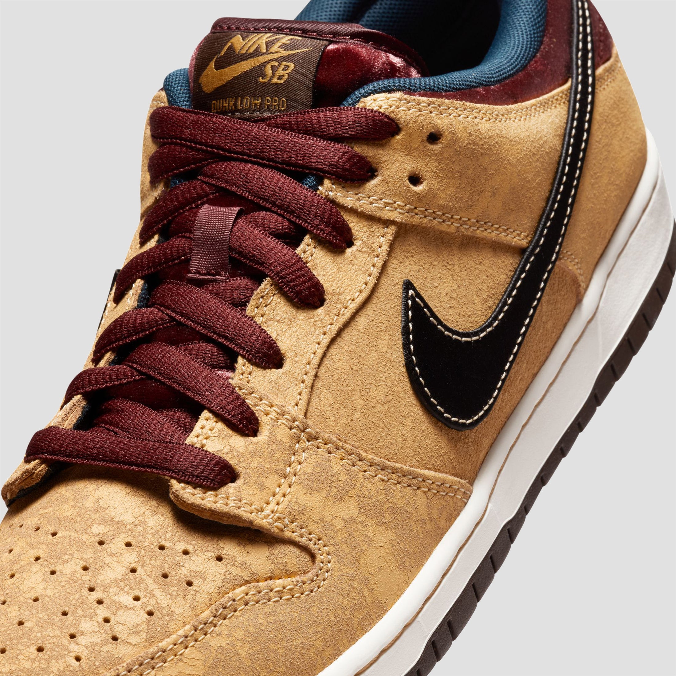 Nike SB Dunk Low Pro Cinema Celestial Gold / Black / Dark Team Red