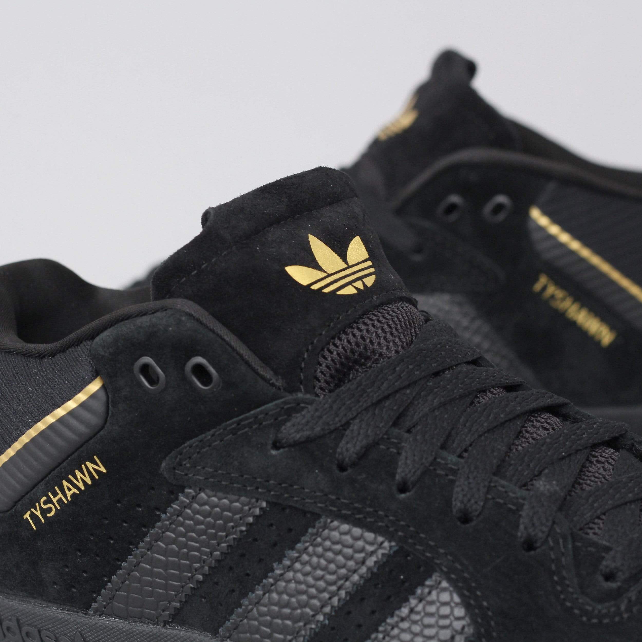 Adidas shoes hotsell gold and black