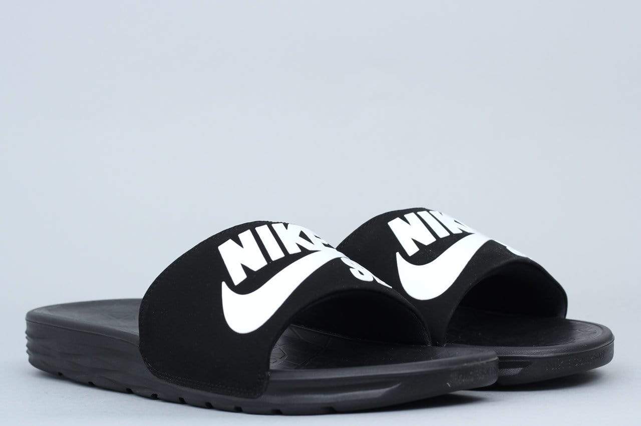 Nike sb benassi solarsoft black sale & white slides