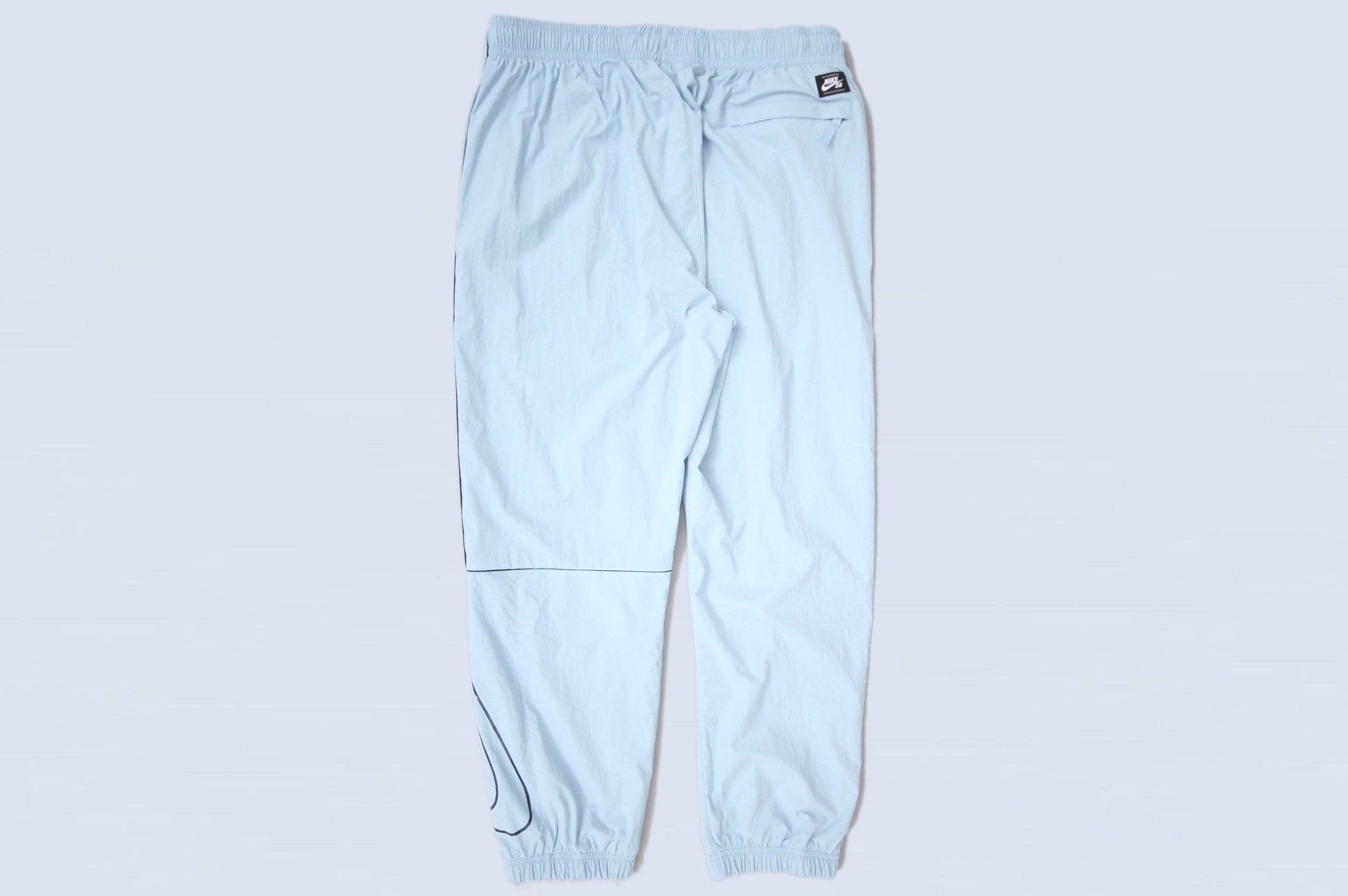 Nike sb swoosh track cheap pants white