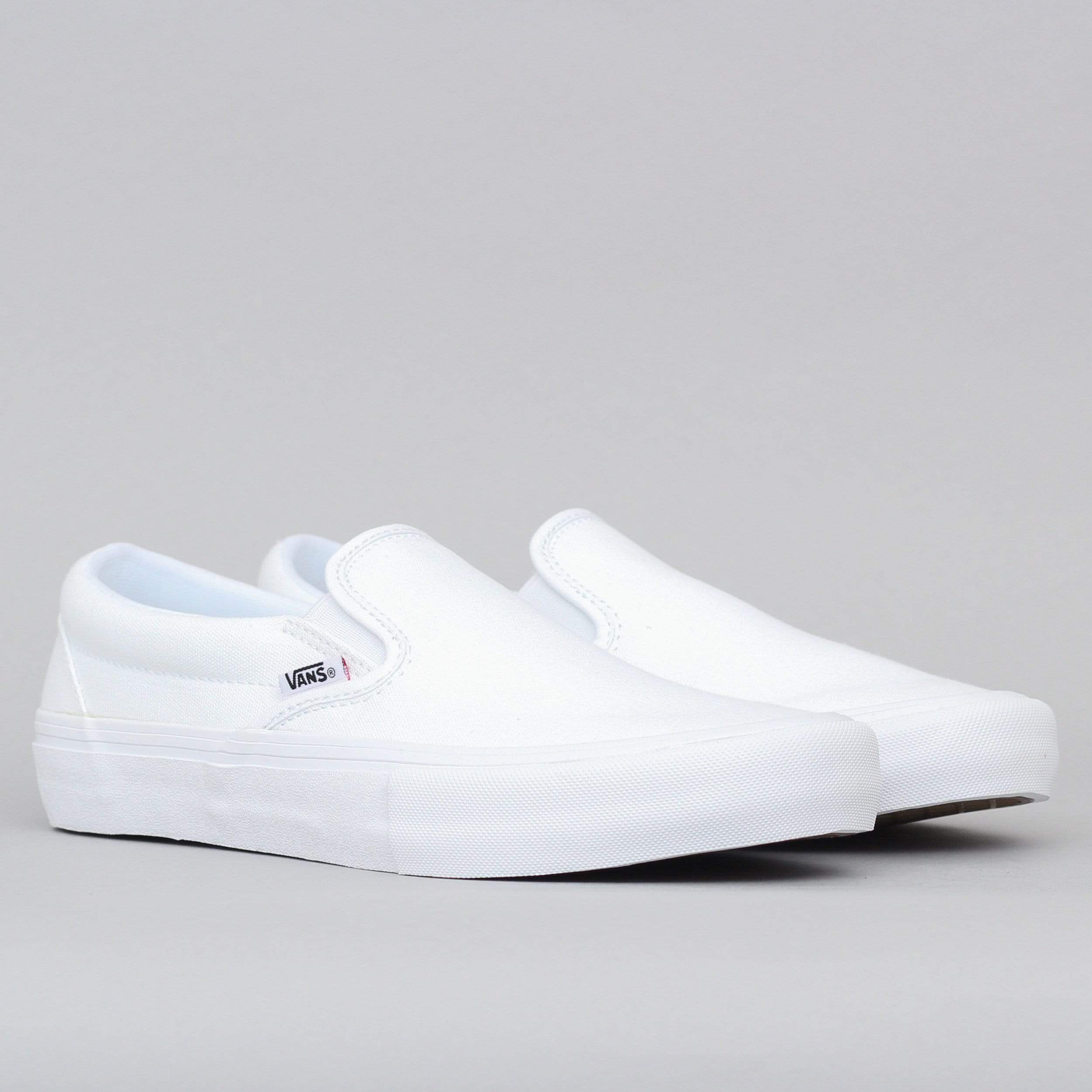 Plain white cheap vans slip ons