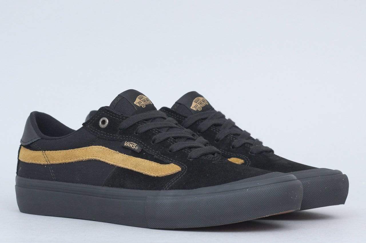 Vans 112 2025 black cumin